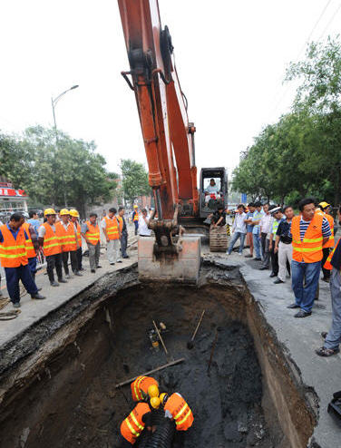 Road sank due to days of rainfall in BJ