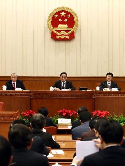 China's parliament adopts state compensation law