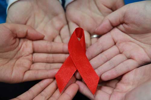 HIV positive teacher sues county government