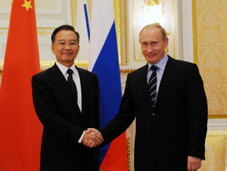 Premier Wen visits Russia and Tajikistan