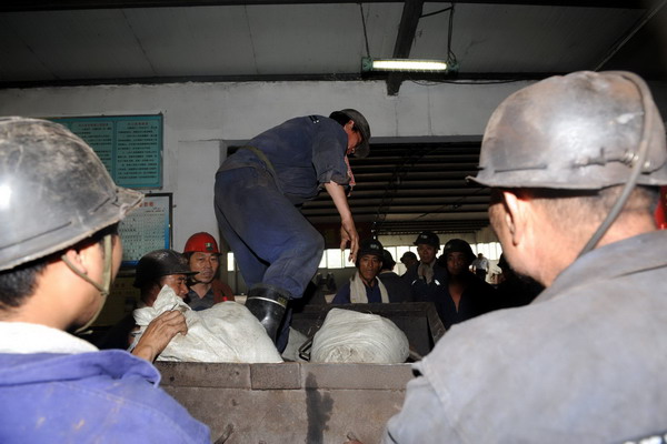 Rescue continues for 28 trapped miners