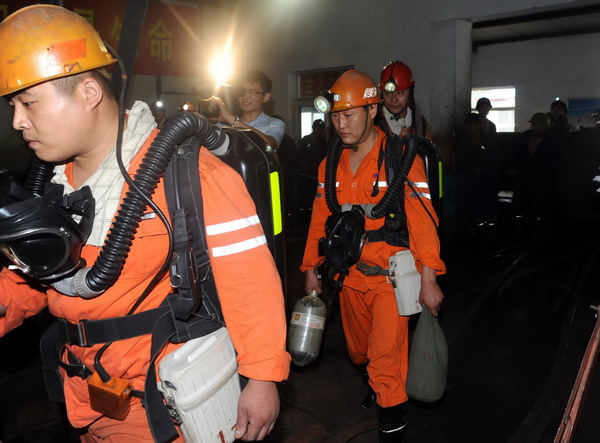 Rescue continues for 28 trapped miners