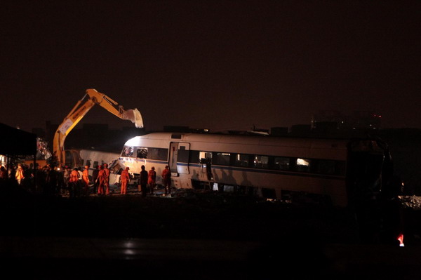 Train wreckage dismantled for probe