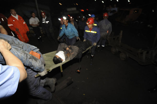 3 of 26 trapped rescued after NE China mine flood