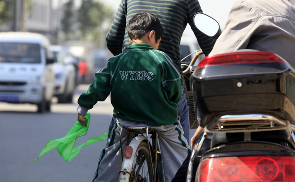 Primary school halts use of green scarves