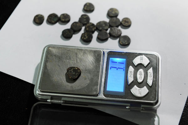 Ancient bronze coins found near old Silk Road