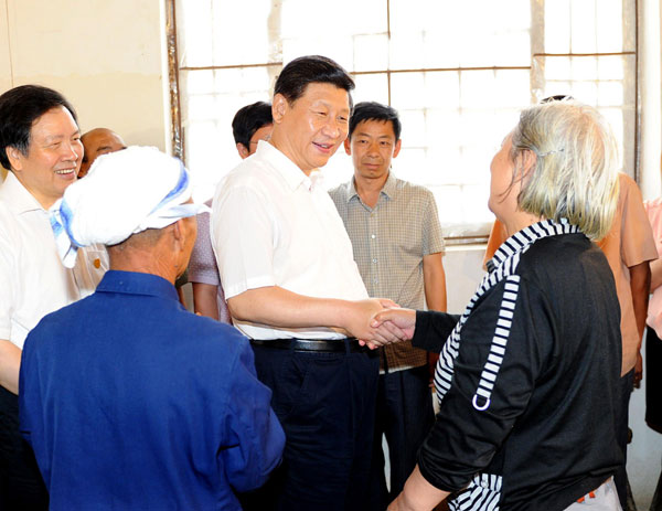 Xi urges CPC members to keep China red