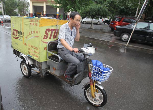 Feeling the heat: Beijing express courier