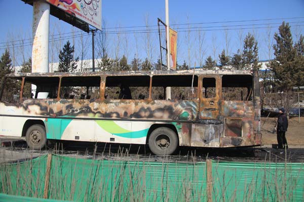 10 dead, 17 injured in NE China bus fire