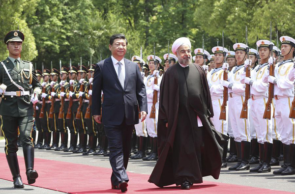 China, Iran pledge to boost ties
