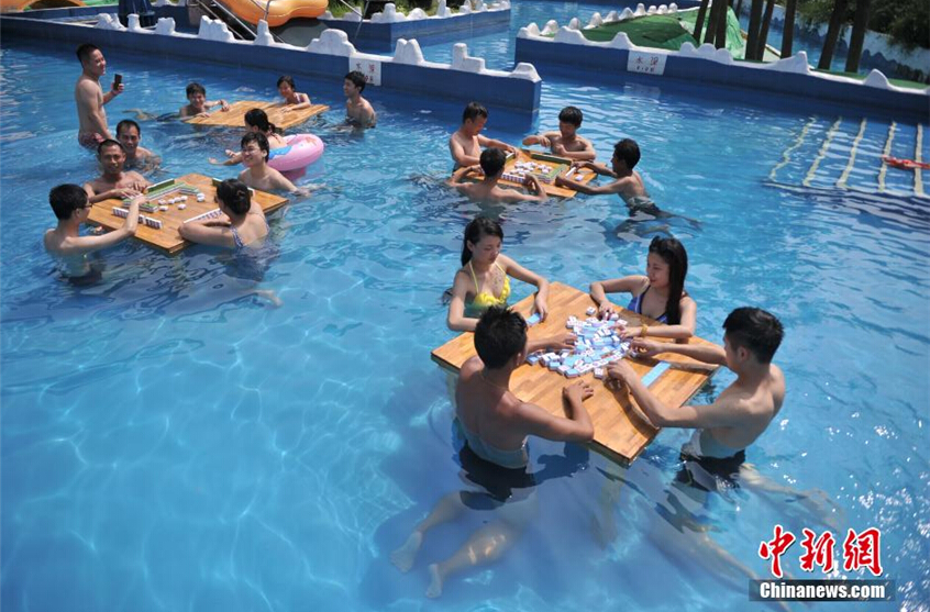 Beating the heat with mahjong, water fights and massage