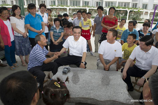 Premier Li stresses urbanization, modern agriculture