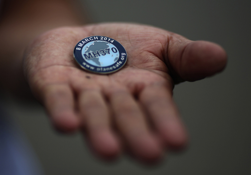 Families find comfort in MH370 passengers' mementos