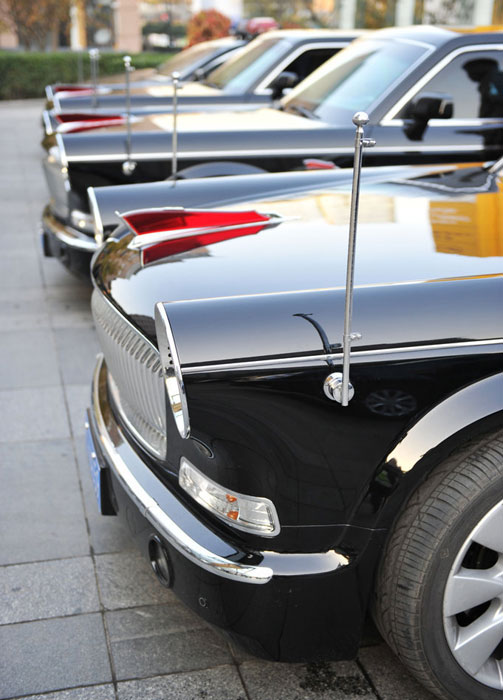 Hongqi limousines prepared for guests during APEC