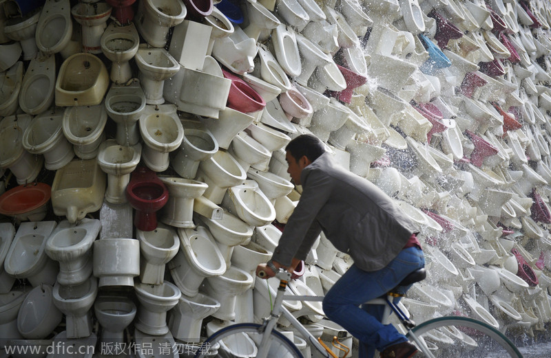 Controversial toilet waterfall stays in Foshan