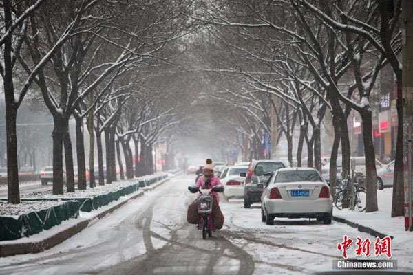 Spring brings snow and sunshine across China