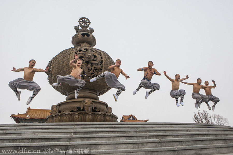 Buddhist monk breaks brick in kung fu