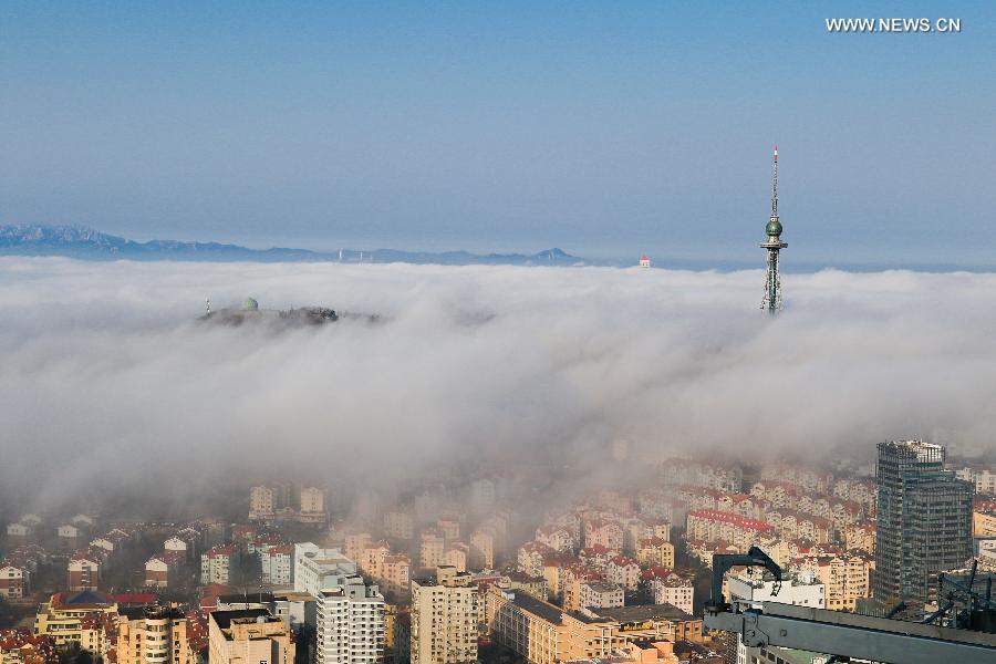 Buildings covered by fog in China's Qingdao