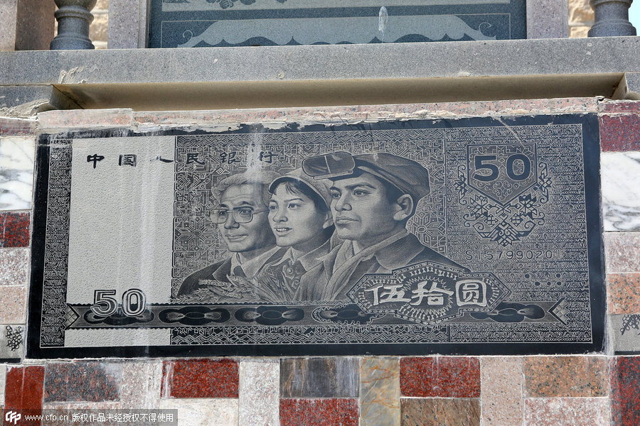 Villager decorates wall with banknote images