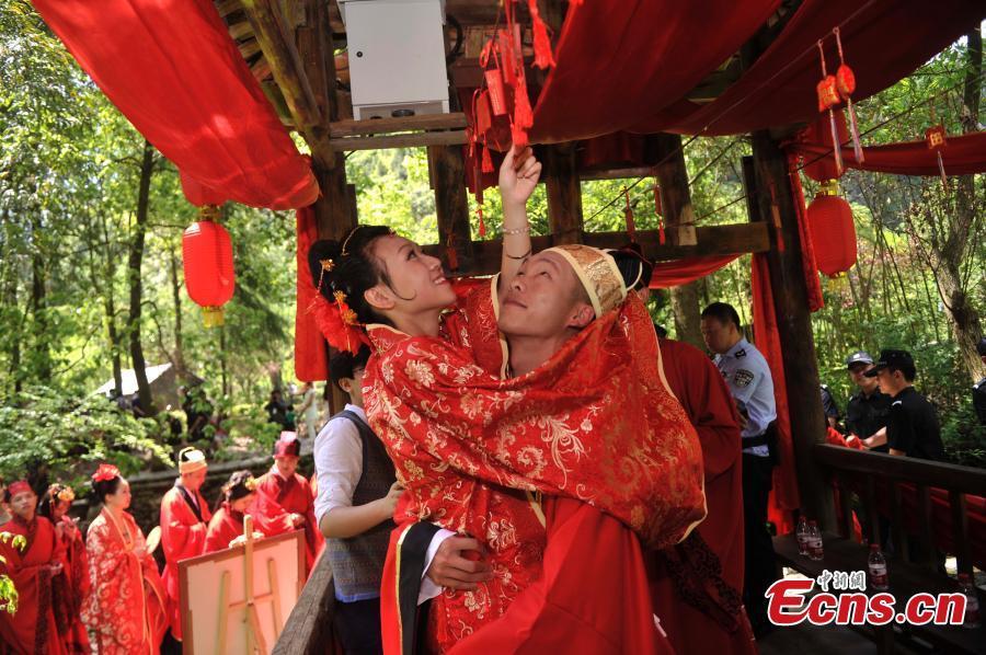 Newlyweds in traditional dress for big day