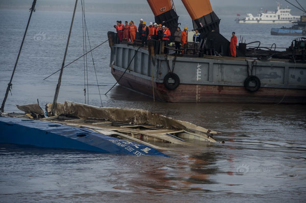 Capsized ship righted, recovery teams set to enter the vessel