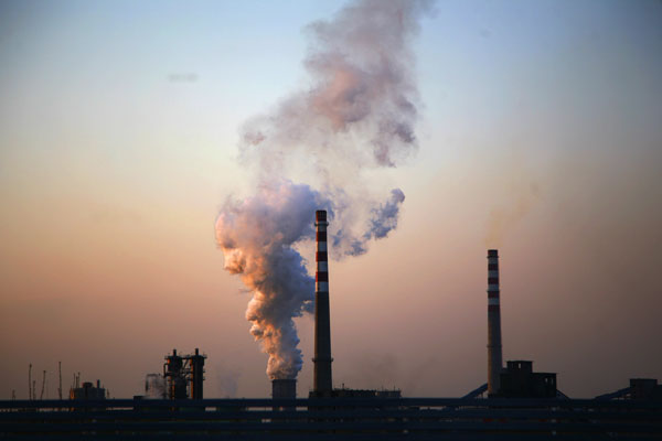 China's greenhouse gas emissions to peak years ahead of goal: report