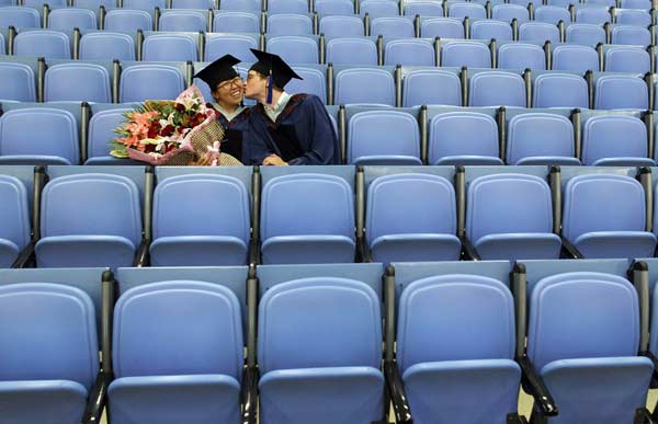 Twice blessed: new graduates are newlyweds