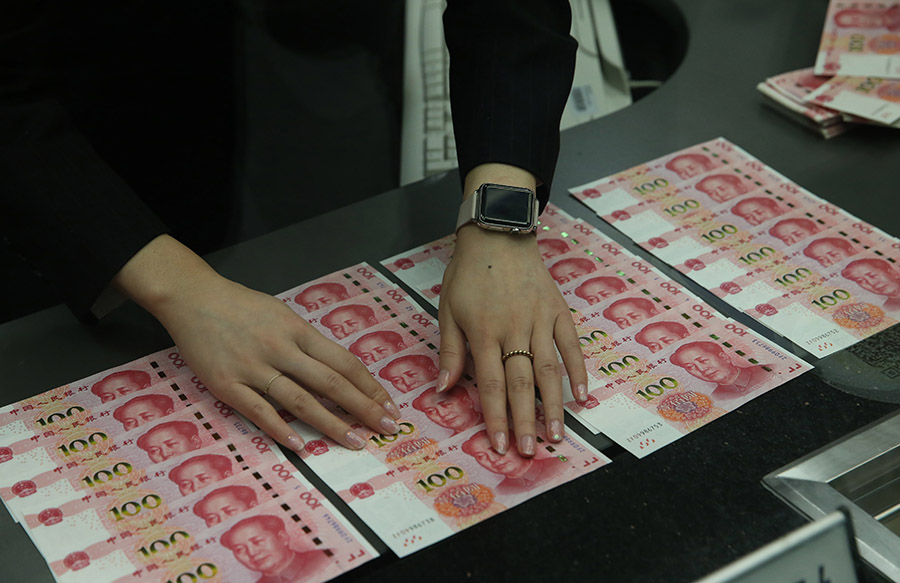 Central bank issues new 100 yuan note
