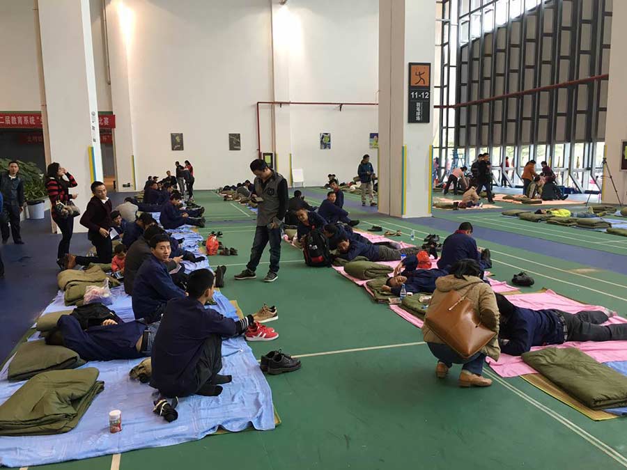 Survivors find temporary home in a shelter after Shenzhen landslide