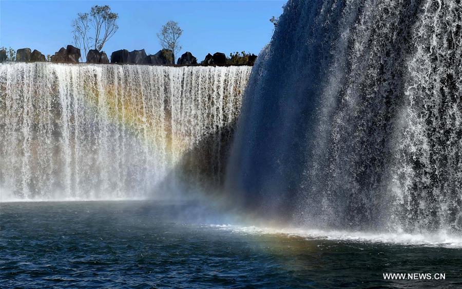 Park featuring 400m-wide manmade waterfall opens in Kunming