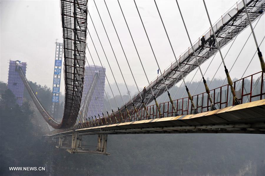 Glass bridge across Zhangjiajie Grand Canyon under construction