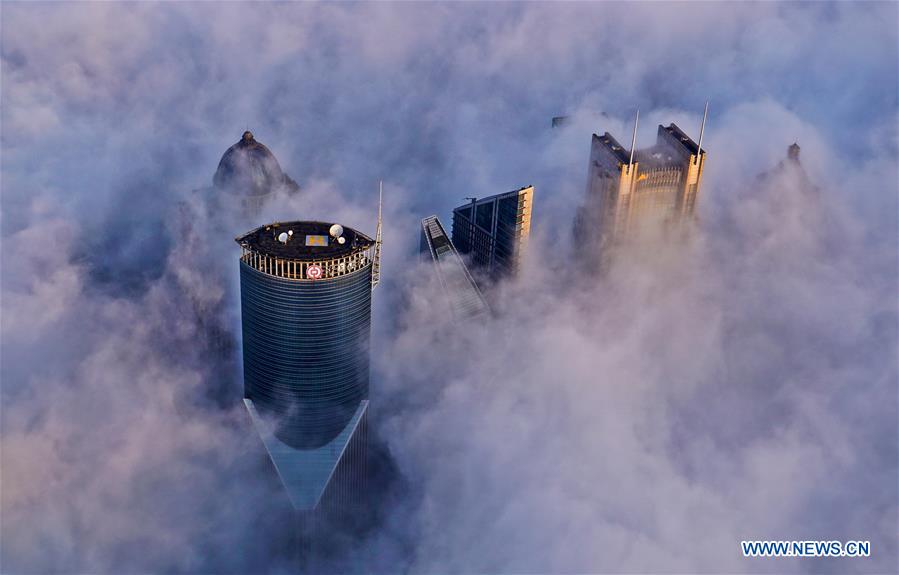 Rising above the clouds: Shanghai's landmark skyscrapers
