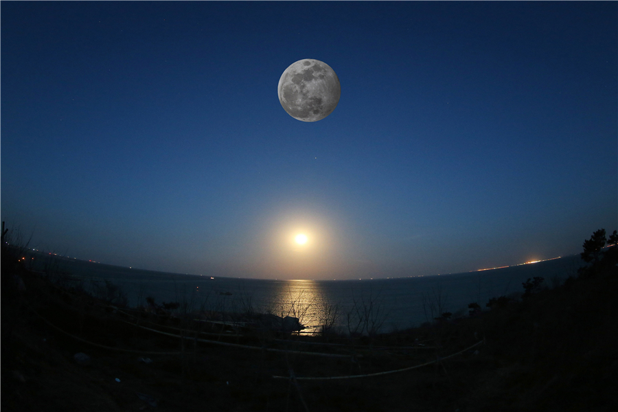 In photos: Lunar eclipses visible in eastern China