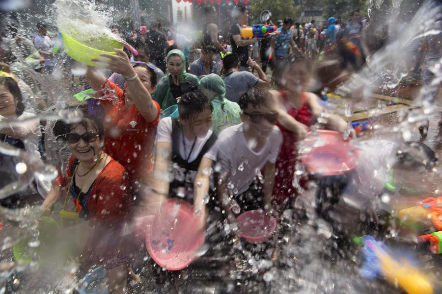 Water-sprinkling festival celebrated in SW China's Yunnan