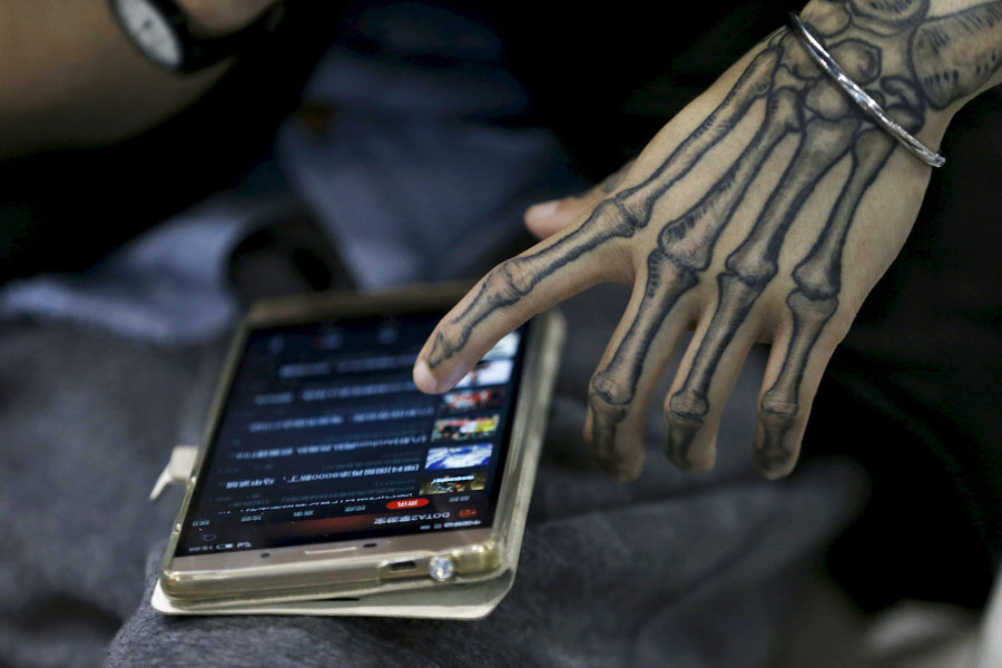 Tattoo fans, artists gather at Shanghai international art festival