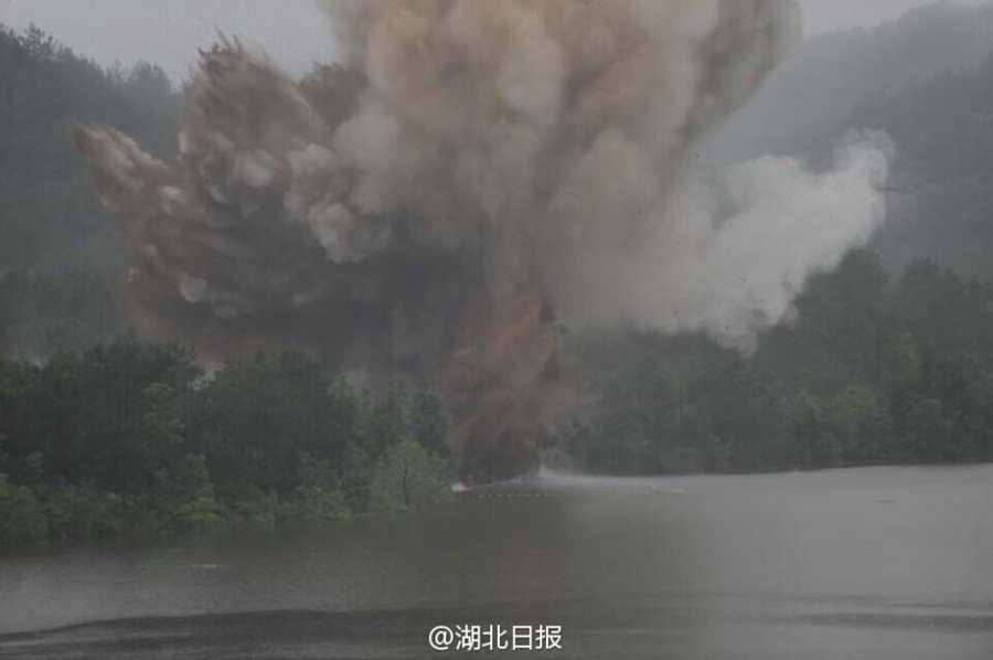 Dam's floodway blasted to discharge water in Hubei province