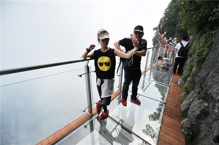 Not for the faint-hearted: Glass bridge opens in Hunan