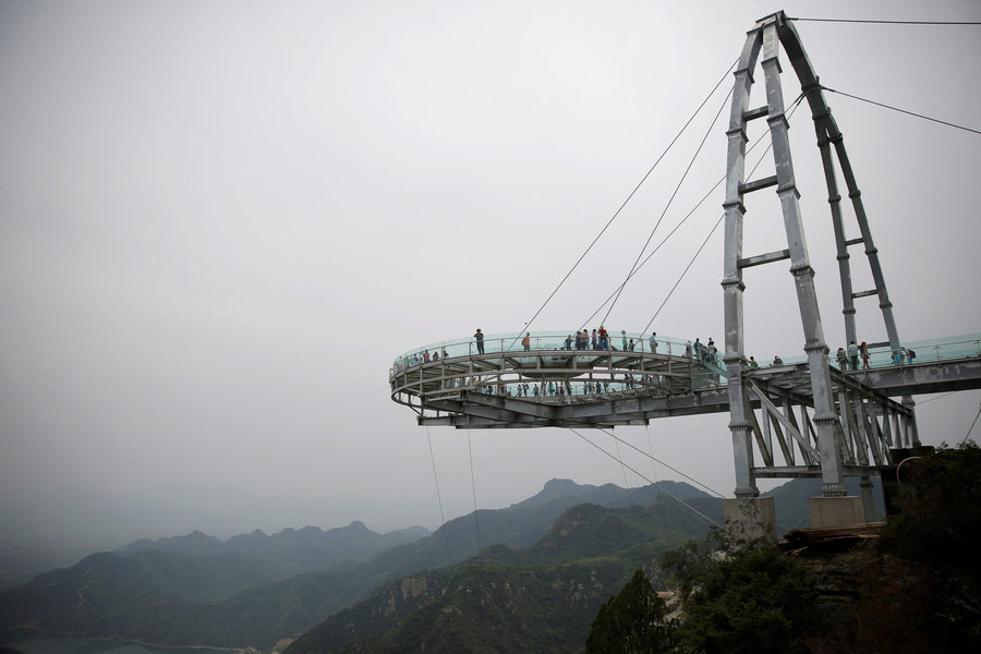 Look down if you dare: world's most vertigo-inducing glass skywalks