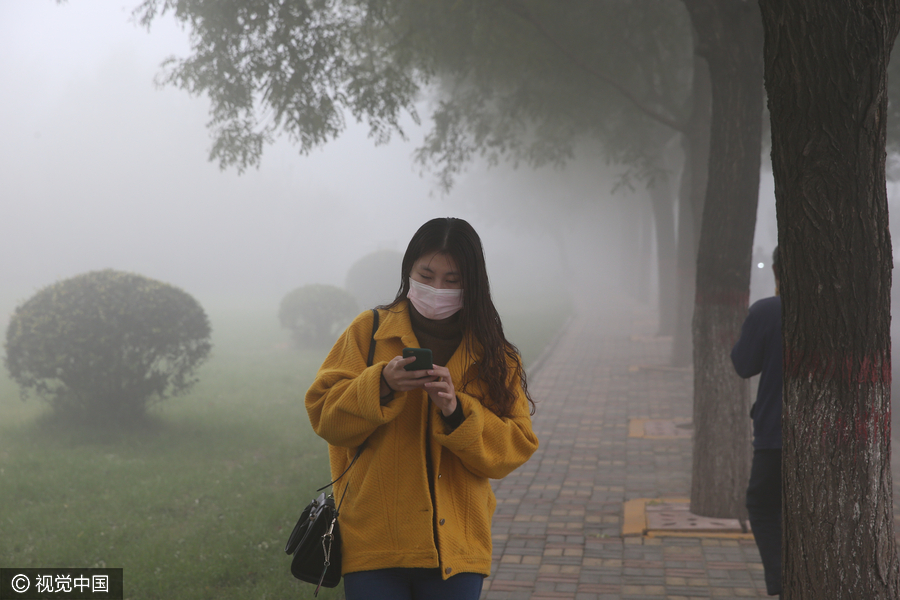 Haze, fog envelop cities, bring down visibility