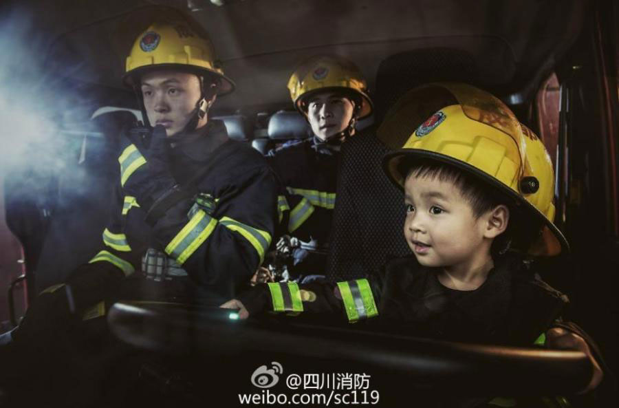 Fireman father and son pose for special family photos