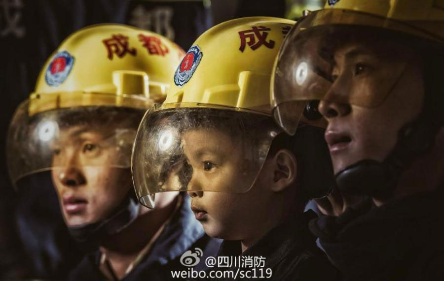 Fireman father and son pose for special family photos