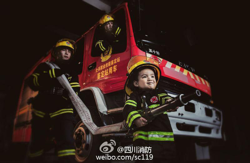 Fireman father and son pose for special family photos