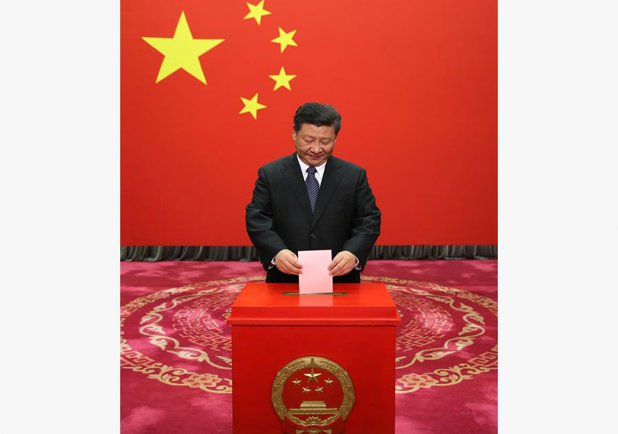 Xi casts vote for new lawmakers