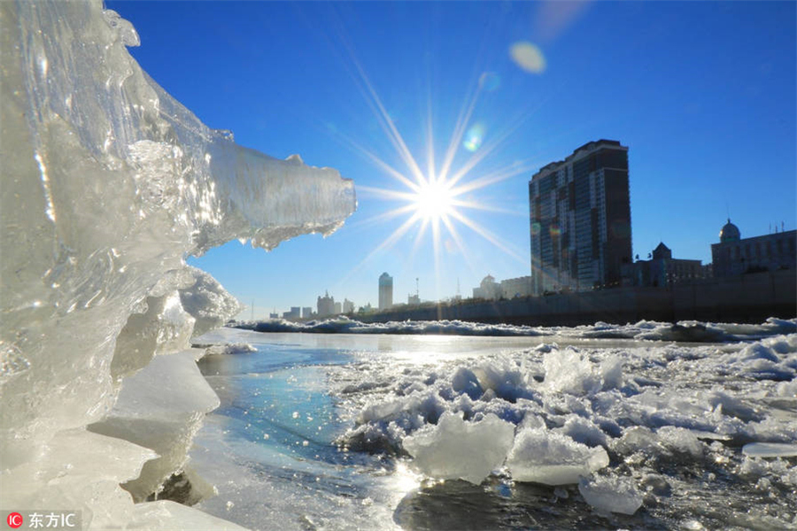Ice sparkles under dazzling colors in Heilongjiang