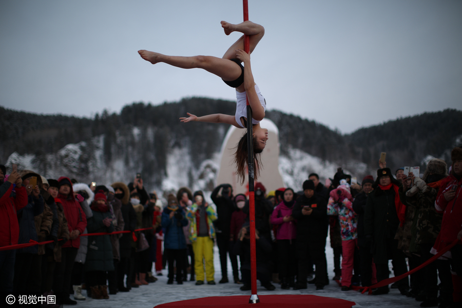 Pole dancers brave the cold in China's northernmost village