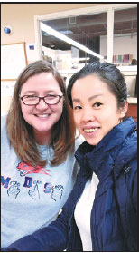 Deaf professor carries smiles across the Pacific