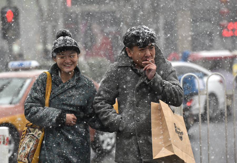 Beijing welcomes first snow in Year of the Rooster