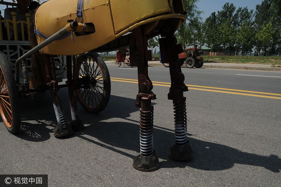 Farmer builds motorized iron horse with recycled material