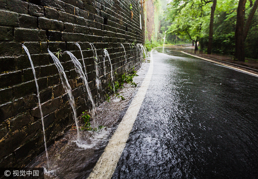 Torrential rain leaves six dead, three missing in China