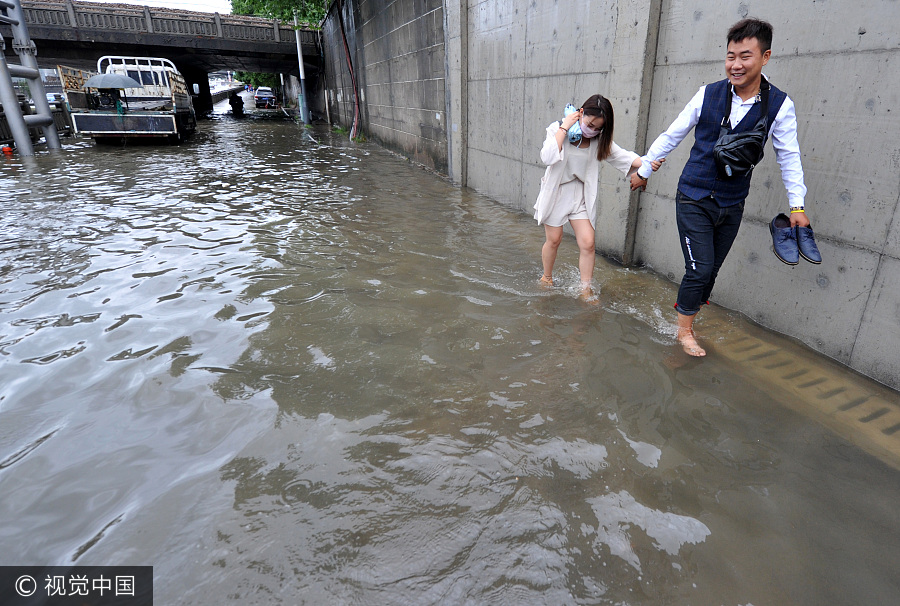 Torrential rain leaves six dead, three missing in China